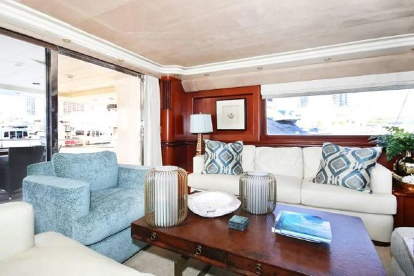 a living room with a large window aboard AMADEUS Yacht for Sale