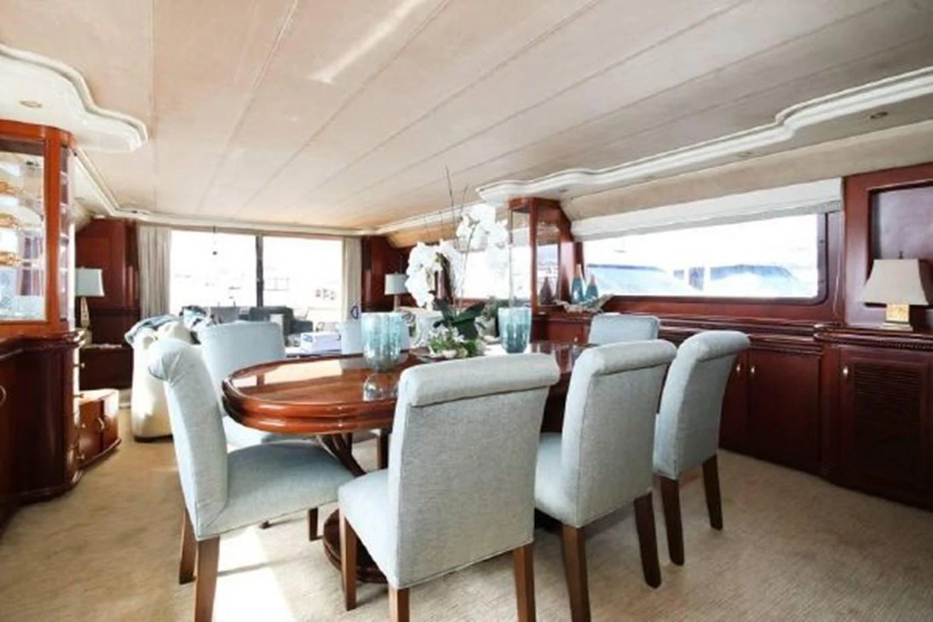 a dining table in a house aboard AMADEUS Yacht for Sale