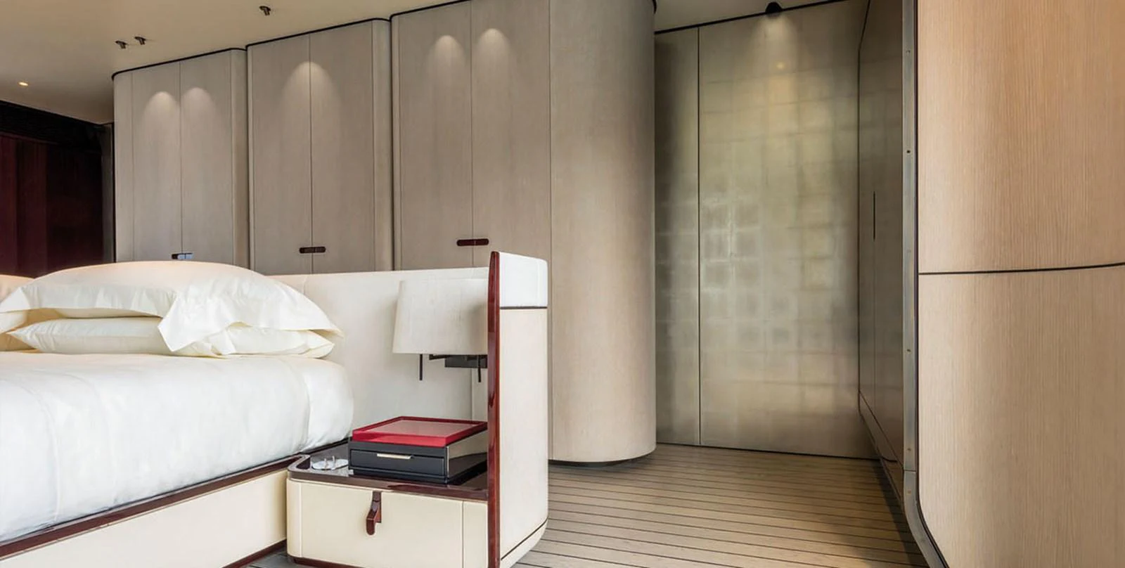 a room with a bed and a desk aboard VICIOUS RUMOUR II Yacht for Sale