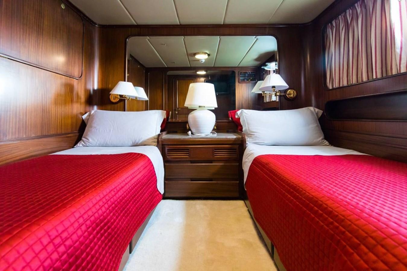 a couple of beds in a hotel room aboard INDIA Yacht for Sale
