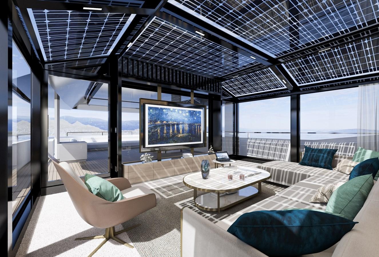 a room with a large screen and a couch and a table aboard ARCADIA 115/06 Yacht for Sale