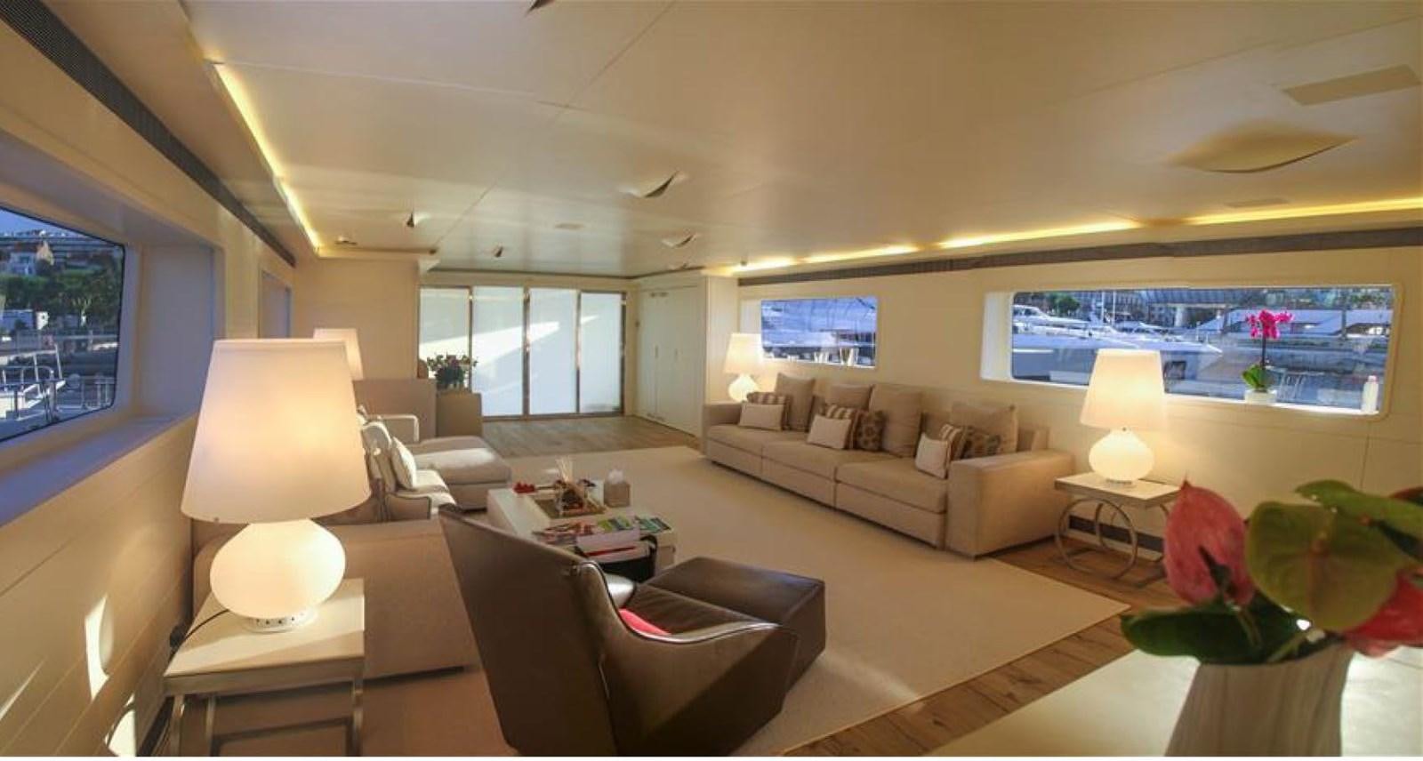 a living room with a couch and a table aboard ADMIRAL 35 Yacht for Sale