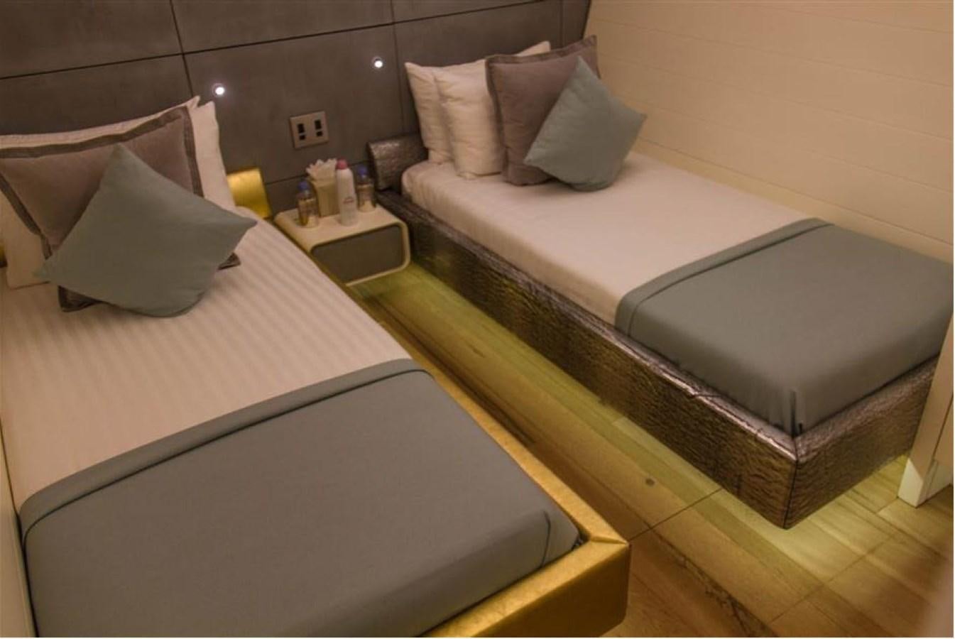 a couple of beds in a hotel room aboard ADMIRAL 35 Yacht for Sale