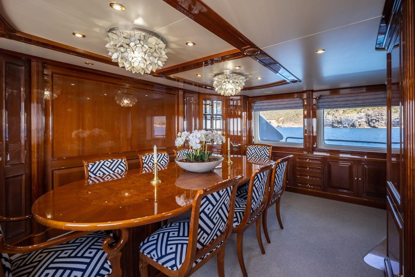 a dining room with a table aboard SERENO Yacht for Sale