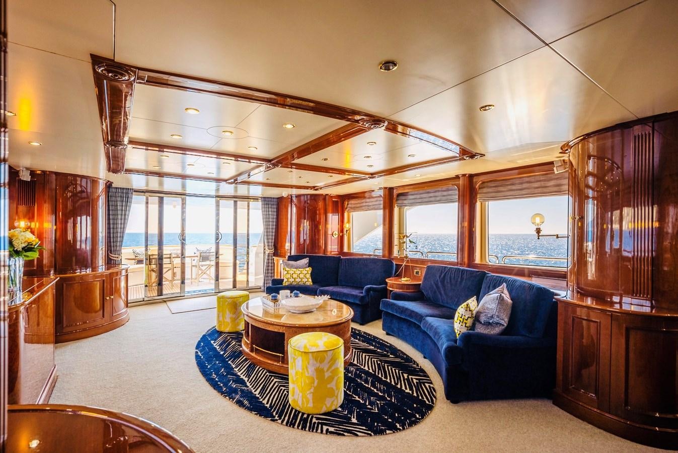 a living room with a large window aboard SERENO Yacht for Sale
