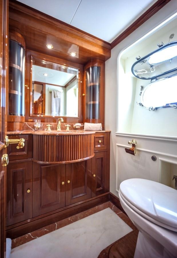 a bathroom with a large mirror aboard SERENO Yacht for Sale