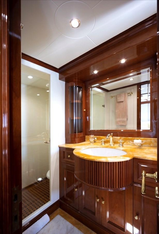 a bathroom with a large mirror aboard SERENO Yacht for Sale