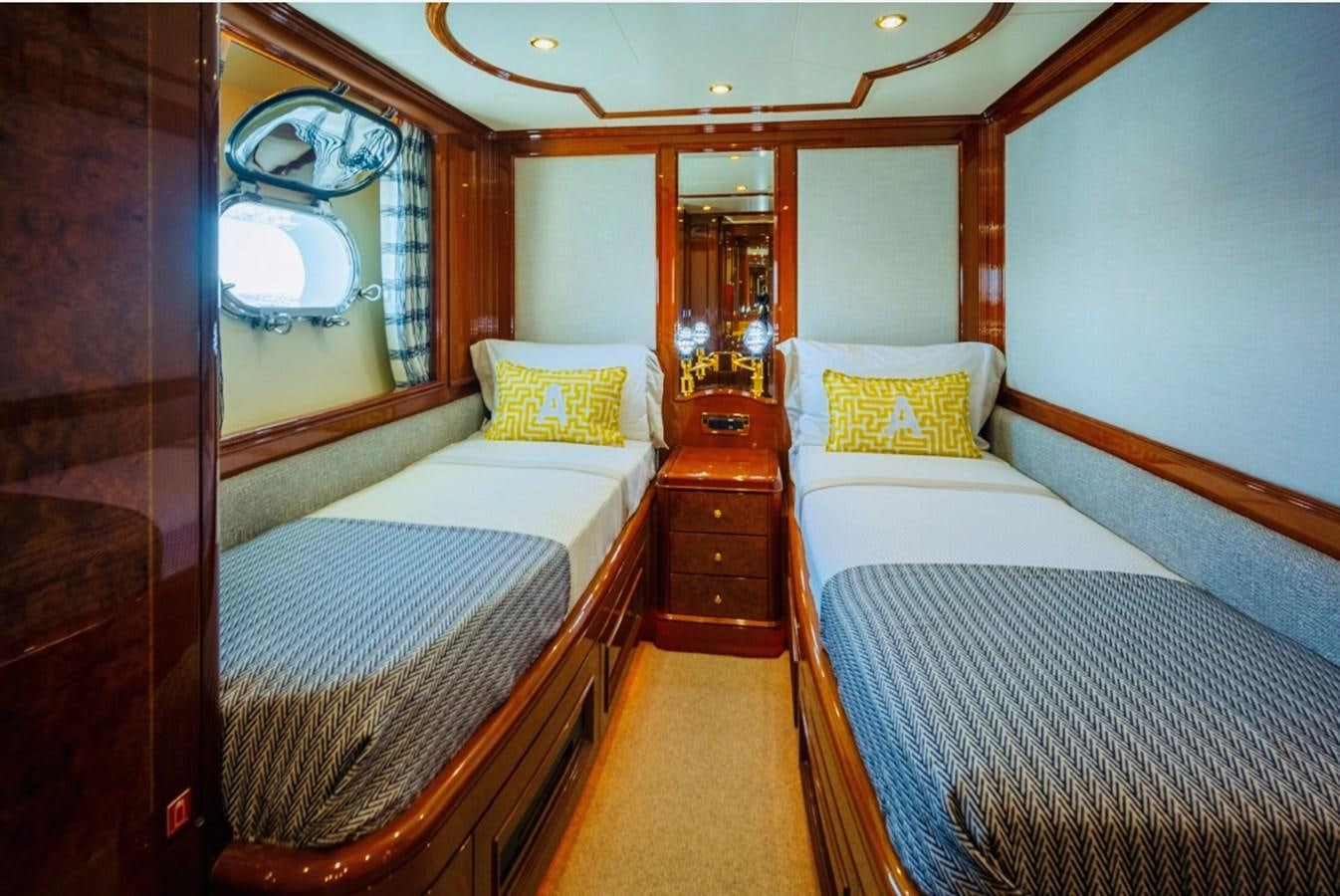 a room with two beds aboard SERENO Yacht for Sale