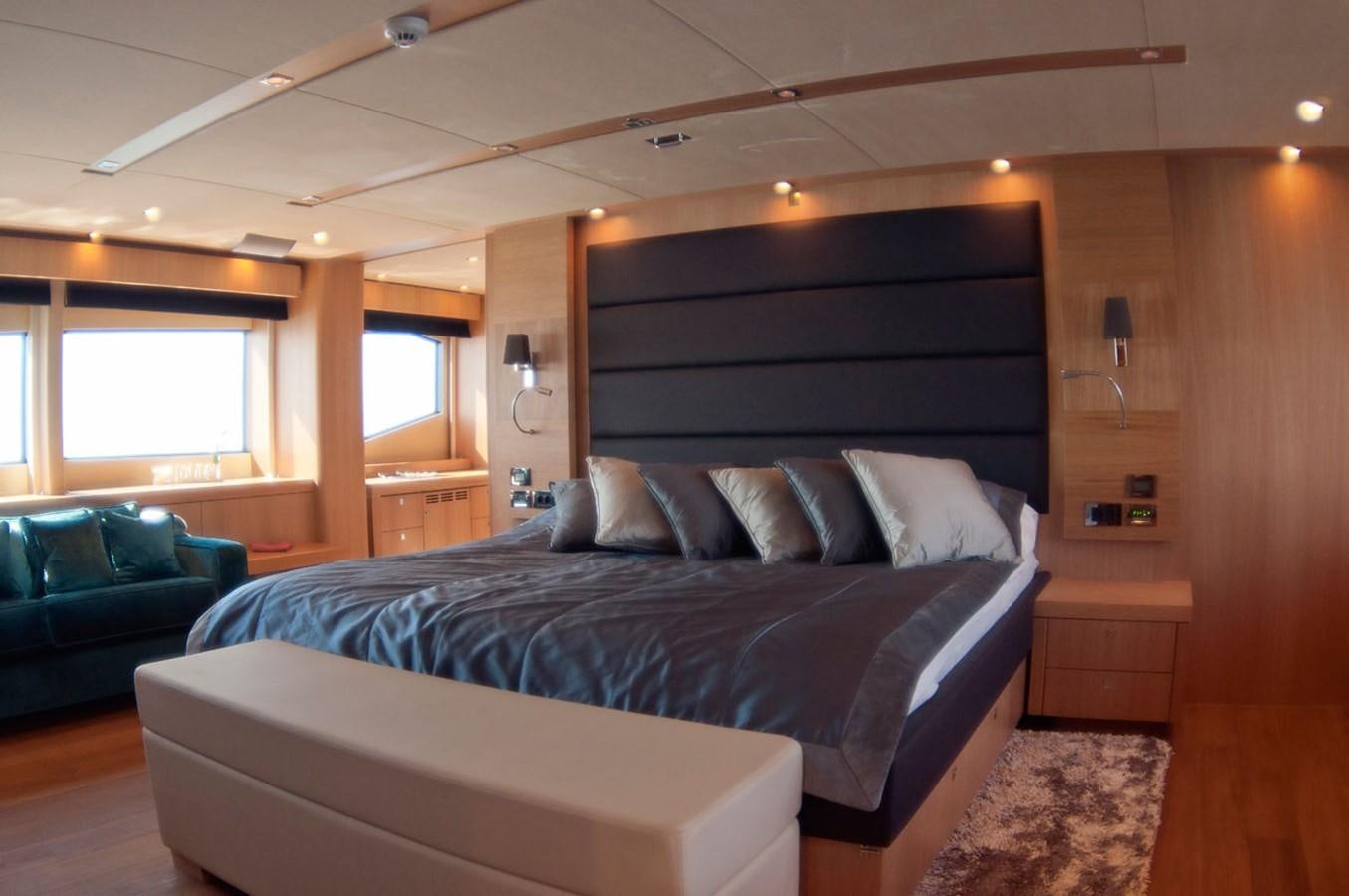 a bed in a room aboard SUN FLOWER Yacht for Sale