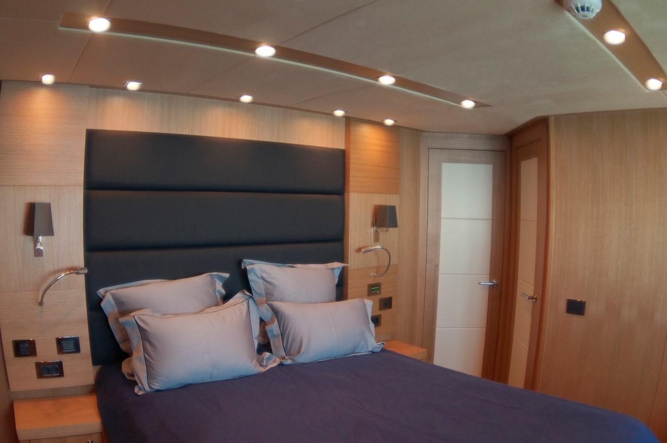 a bed with pillows aboard SUN FLOWER Yacht for Sale