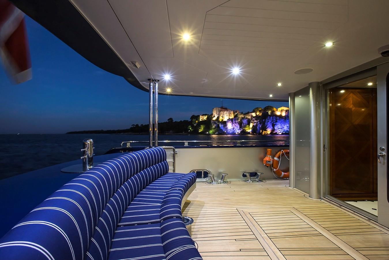 a room with a pool and a couch aboard PRINCESS ILUKA Yacht for Charter