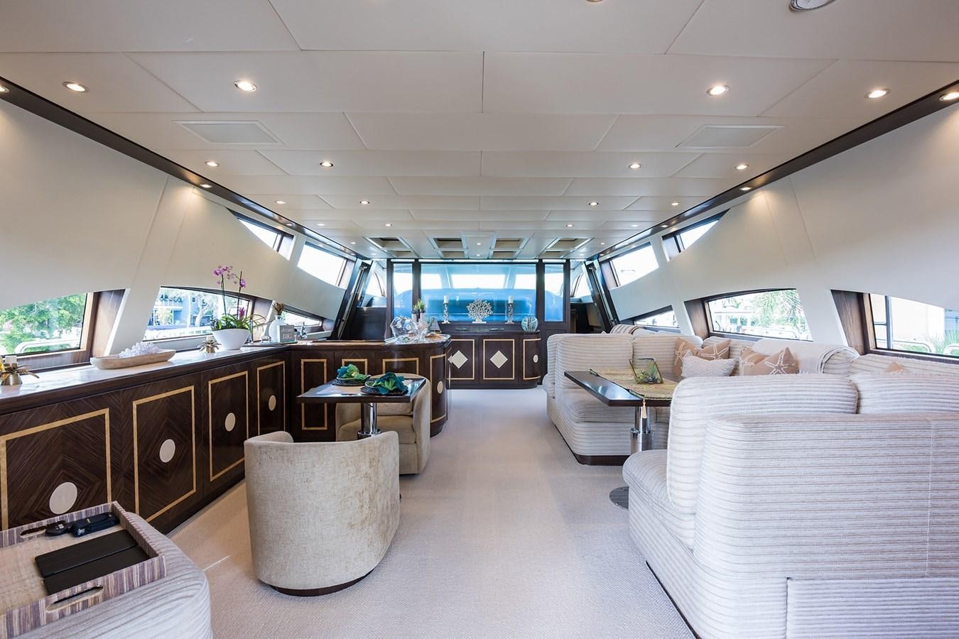a room with a couch and a table aboard 34M LEOPARD Yacht for Sale