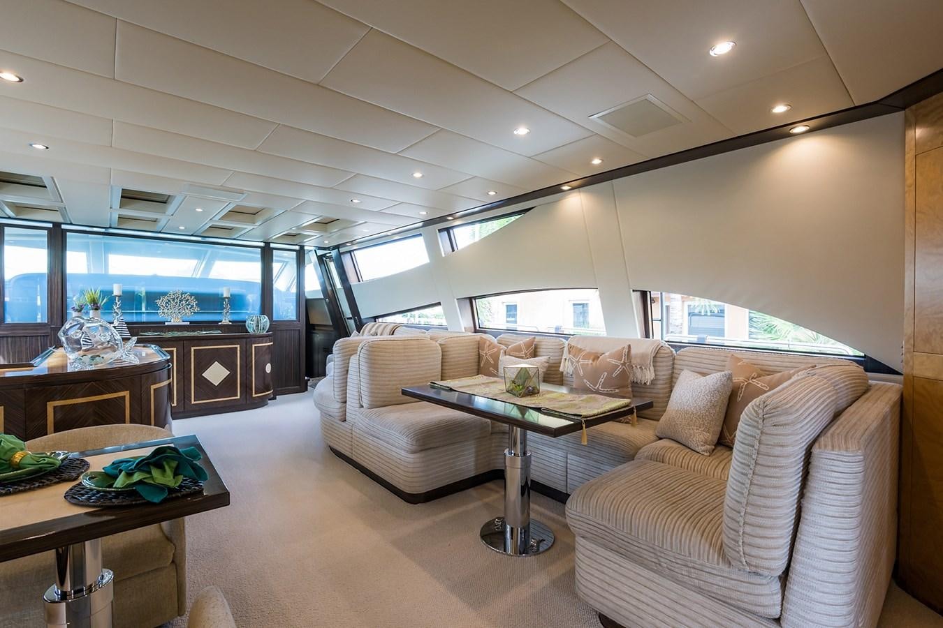 a living room with a couch and a table aboard 34M LEOPARD Yacht for Sale