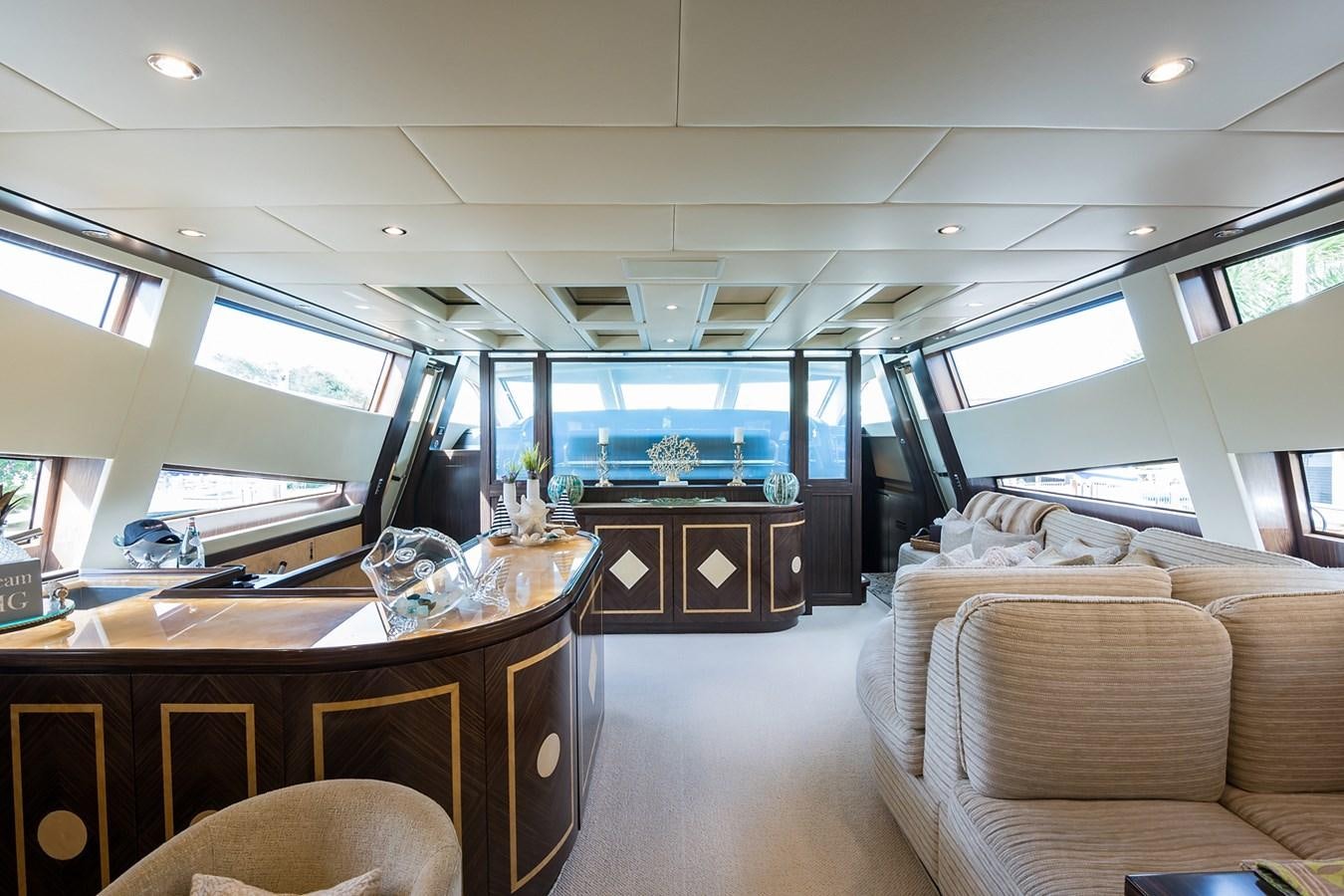 inside of a vehicle with a view of the water and the inside of the boat aboard 34M LEOPARD Yacht for Sale