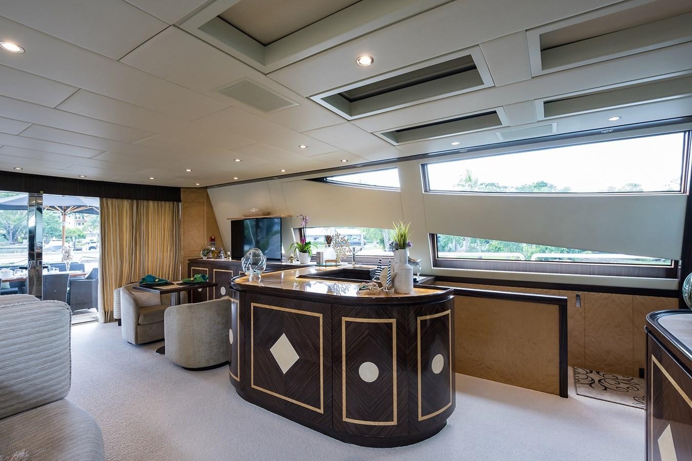 a large kitchen with a large window aboard 34M LEOPARD Yacht for Sale