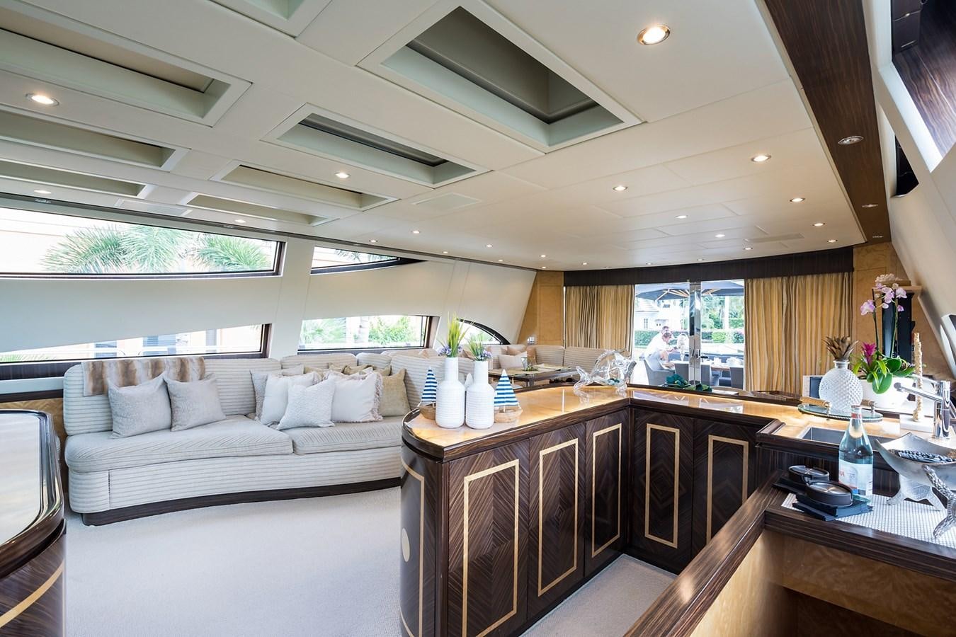 a living room with a couch and a table aboard 34M LEOPARD Yacht for Sale