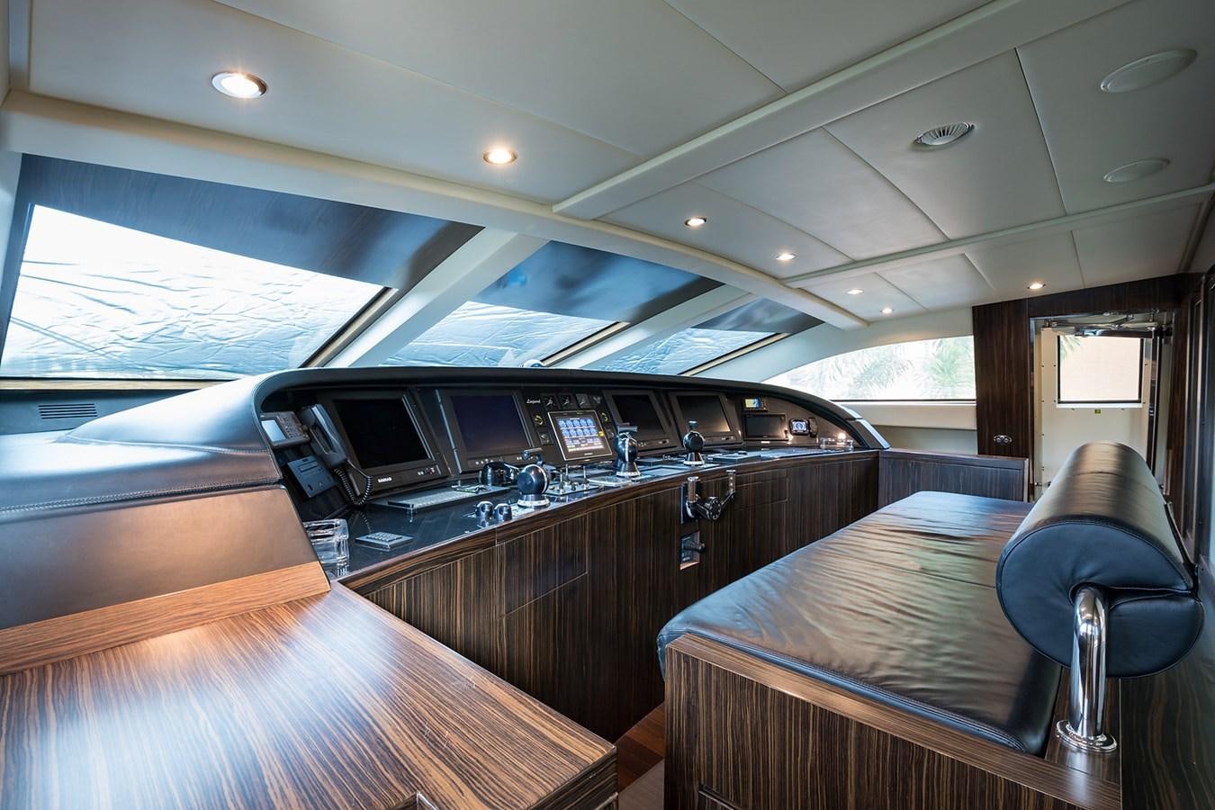 a room with a table and chairs aboard 34M LEOPARD Yacht for Sale