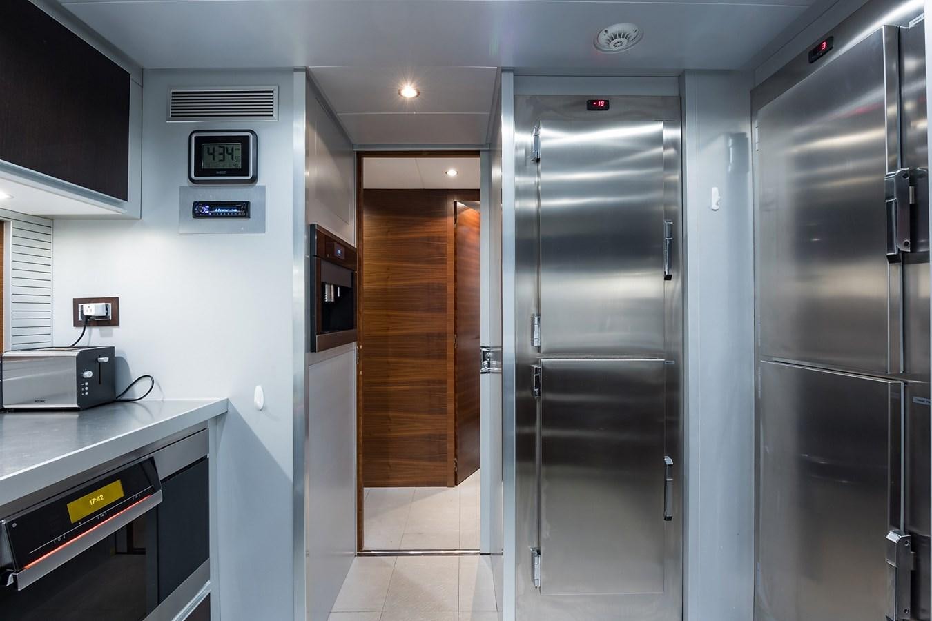 a room with a door and a machine aboard 34M LEOPARD Yacht for Sale
