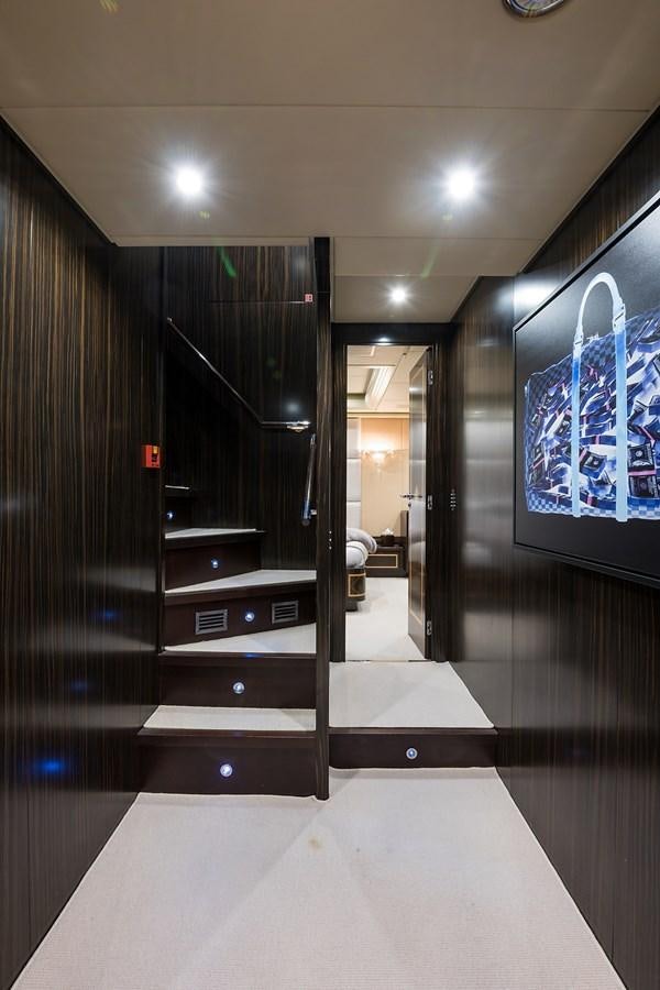 a room with a large mirror aboard 34M LEOPARD Yacht for Sale