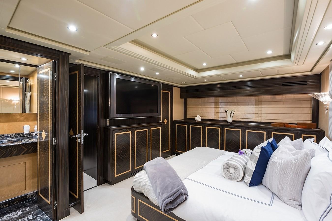 a bed in a room aboard 34M LEOPARD Yacht for Sale
