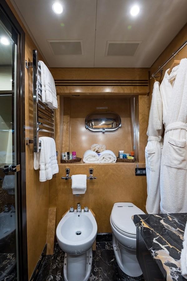 a bathroom with a sink and toilet aboard 34M LEOPARD Yacht for Sale