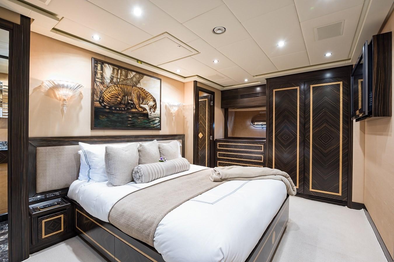 a bed in a room aboard 34M LEOPARD Yacht for Sale