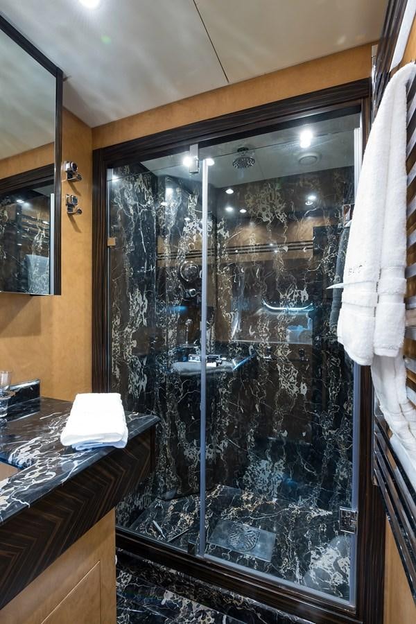 a fish tank in a bathroom aboard 34M LEOPARD Yacht for Sale