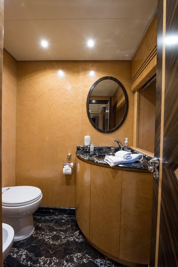 a bathroom with a large mirror aboard 34M LEOPARD Yacht for Sale