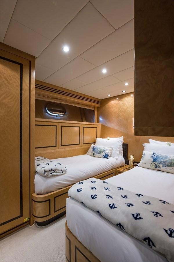 a couple of beds in a room aboard 34M LEOPARD Yacht for Sale