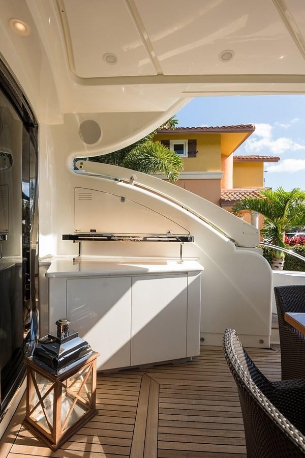 a white rectangular object on a wooden surface aboard 34M LEOPARD Yacht for Sale
