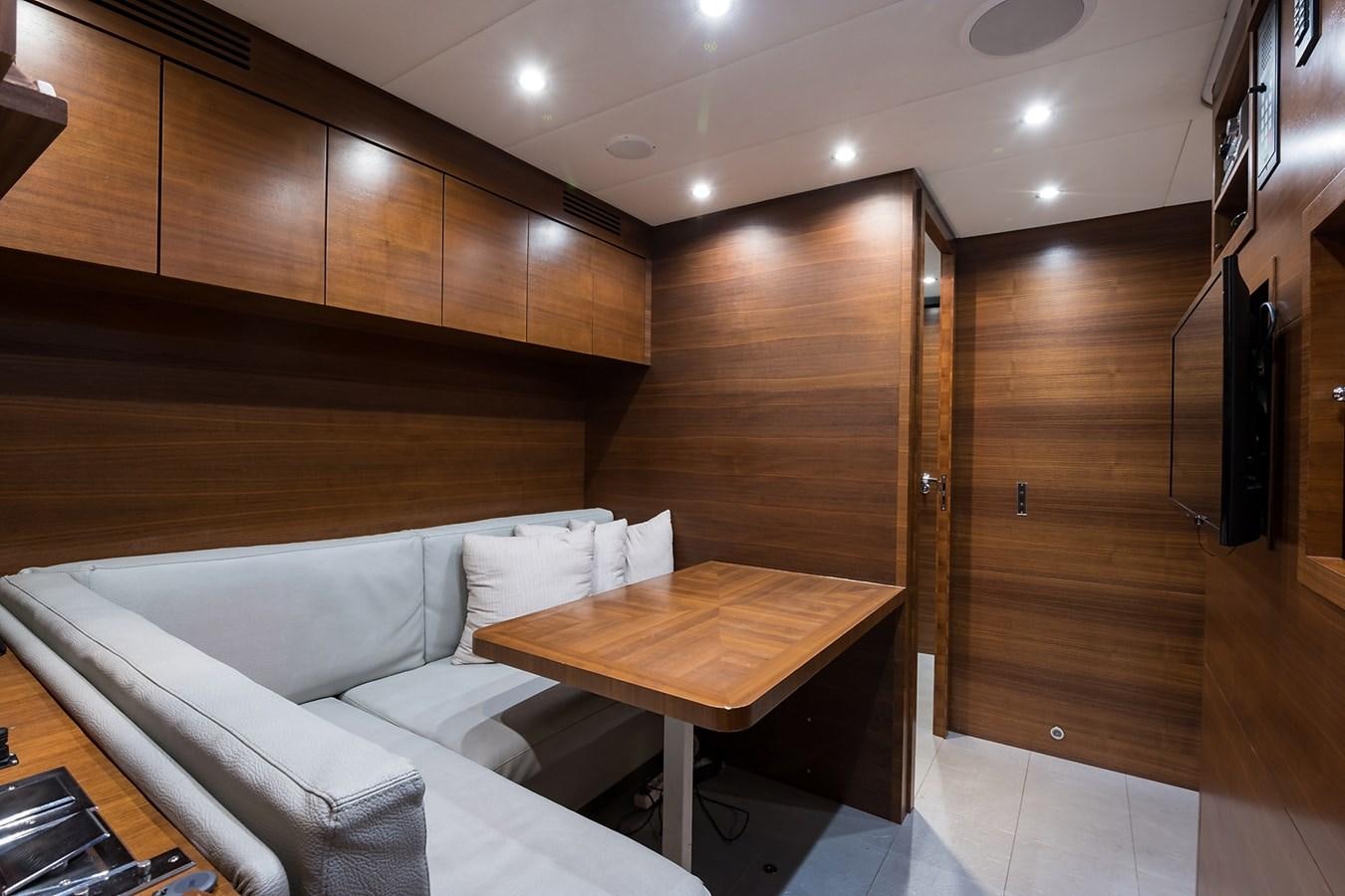 a room with a couch and a table aboard 34M LEOPARD Yacht for Sale