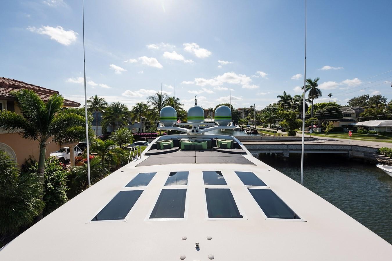 a pool with a building in the background aboard 34M LEOPARD Yacht for Sale