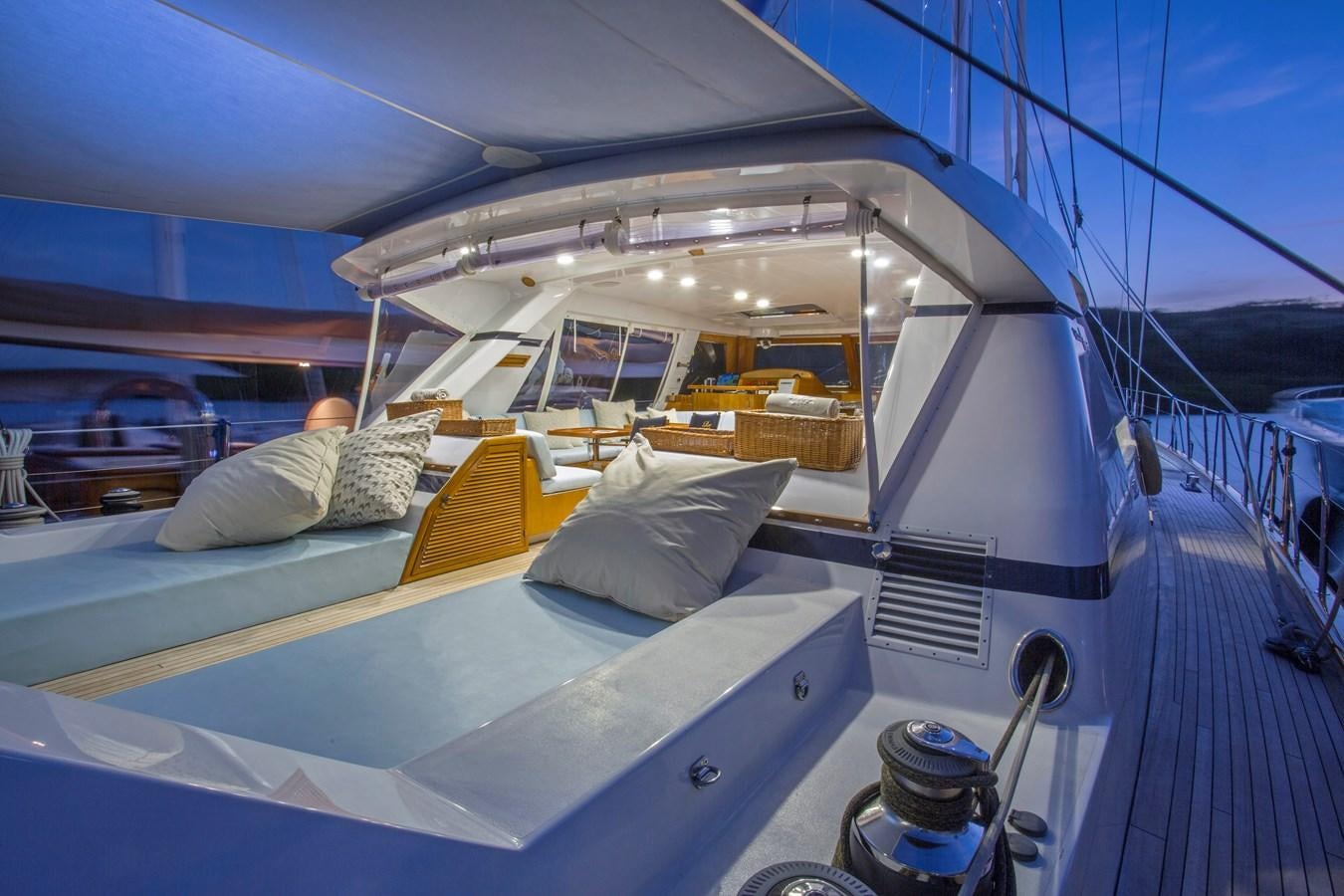 a boat with a bed aboard REE Yacht for Charter