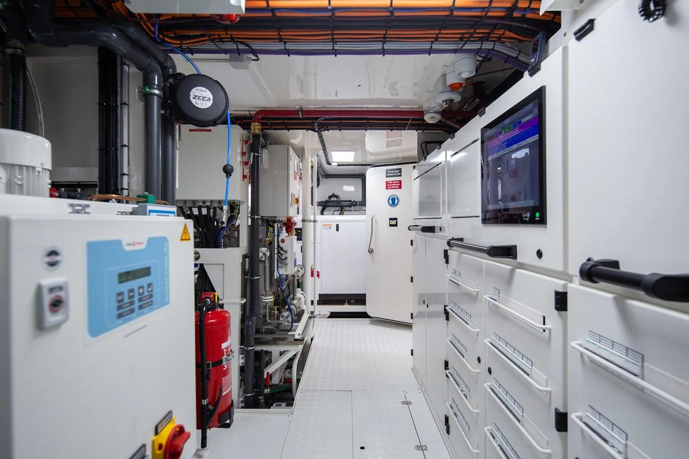 a room with machines and equipment aboard MOONEN 110 MUSTIQUE Yacht for Sale