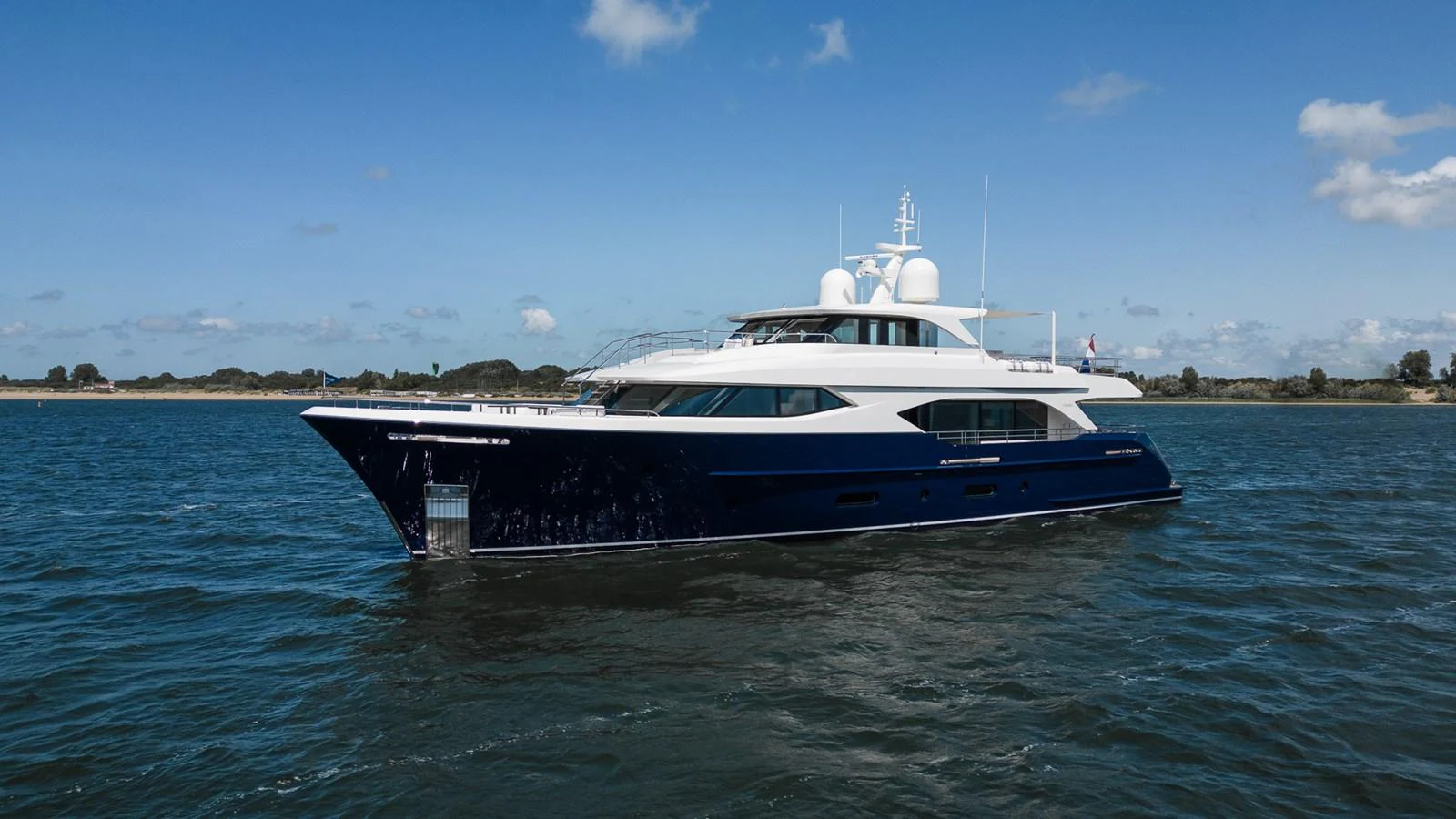 a boat in the water aboard MOONEN 110 MUSTIQUE Yacht for Sale