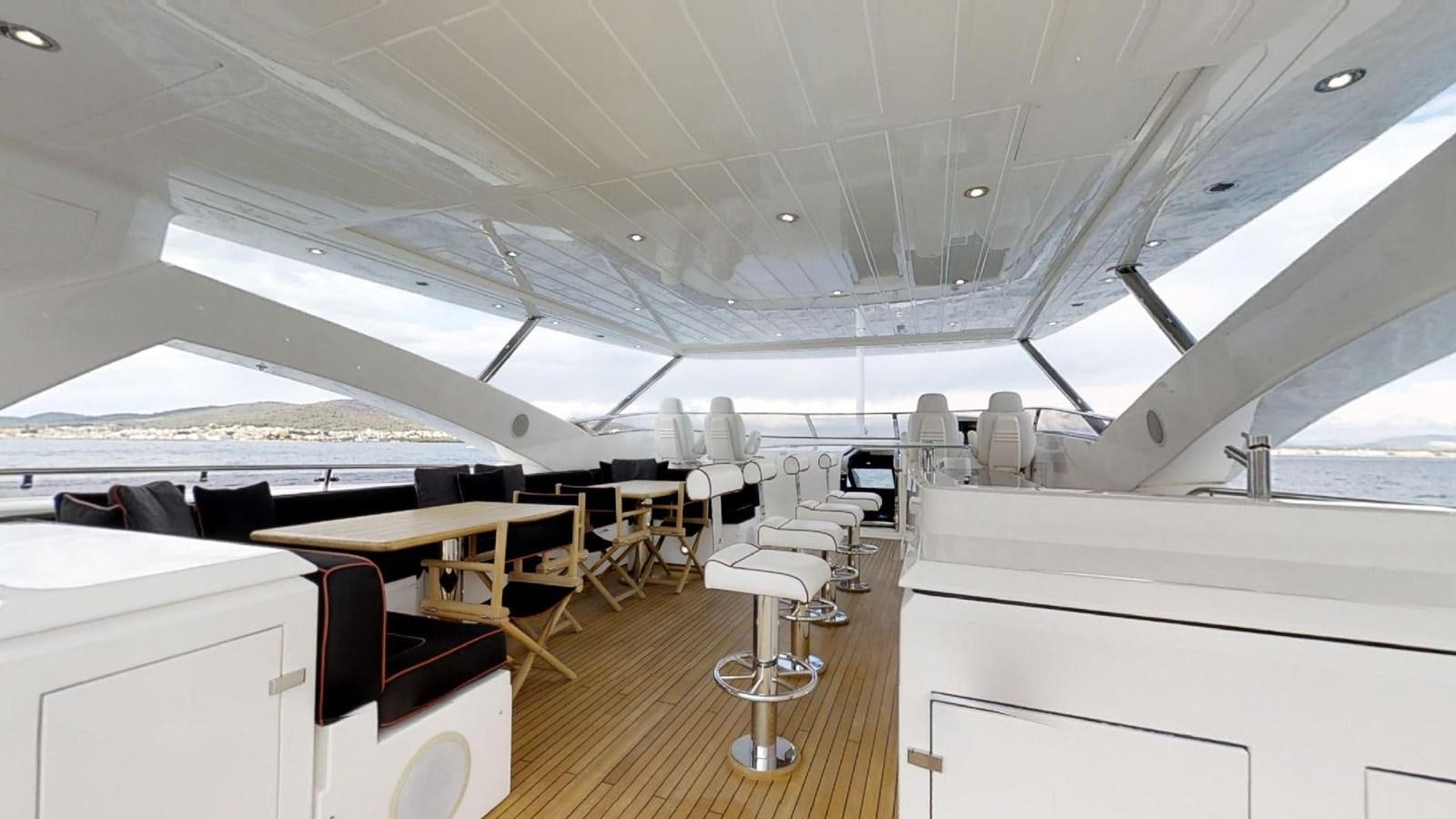 inside of a building with tables and chairs aboard WHITE PEARL I Yacht for Sale