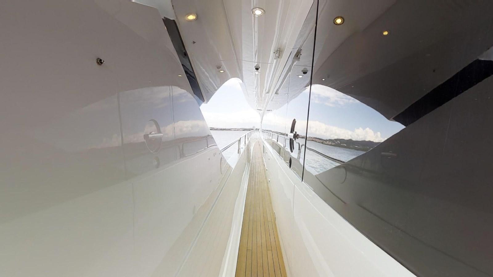 a large white boat with a glass door aboard WHITE PEARL I Yacht for Sale