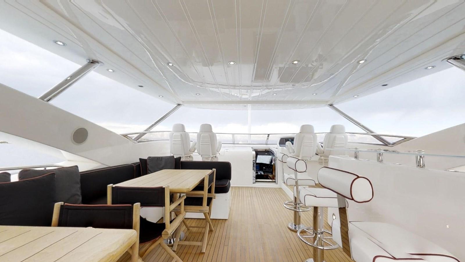 inside of a tent with tables and chairs aboard WHITE PEARL I Yacht for Sale