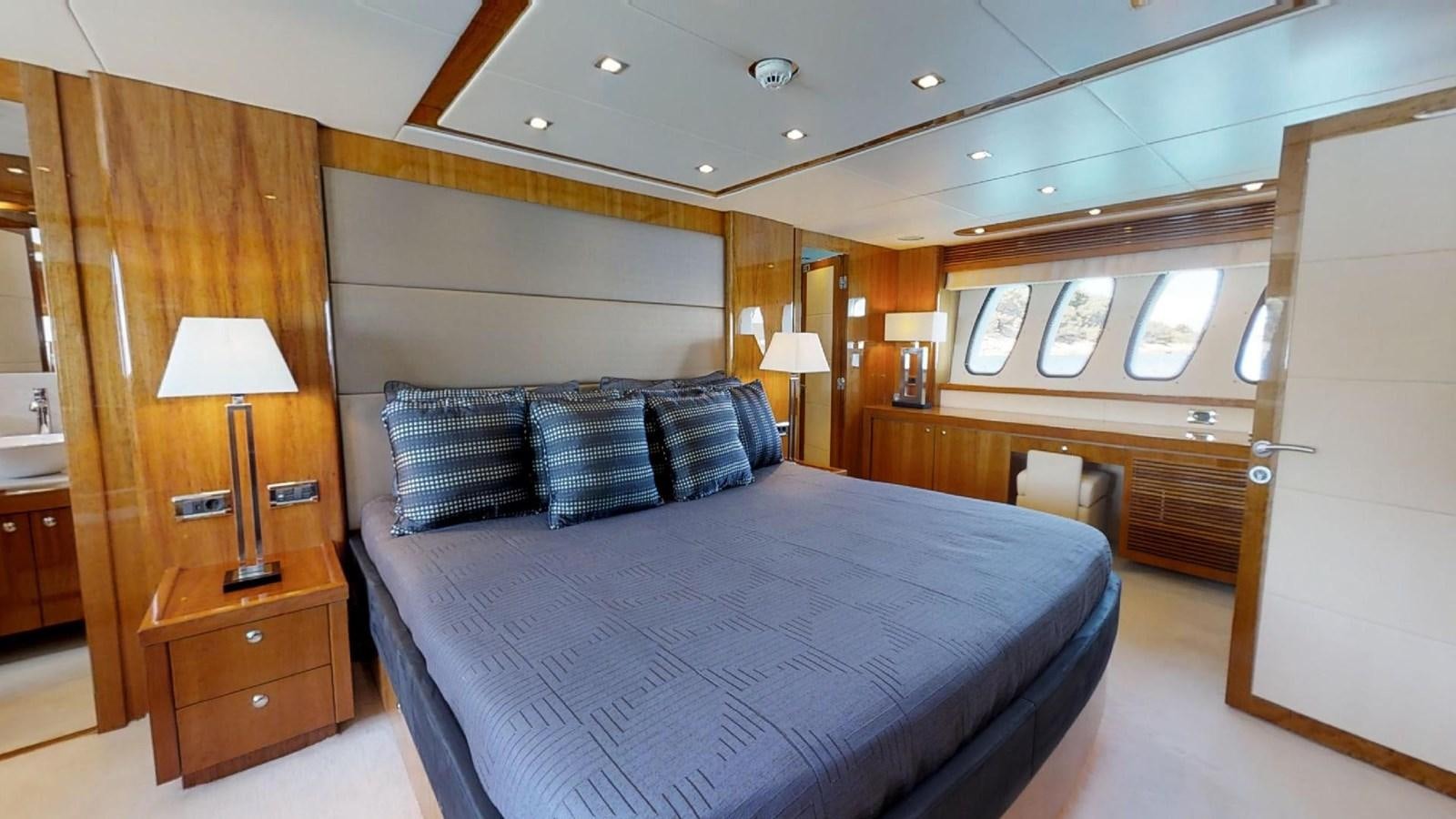 a large bed in a room aboard WHITE PEARL I Yacht for Sale