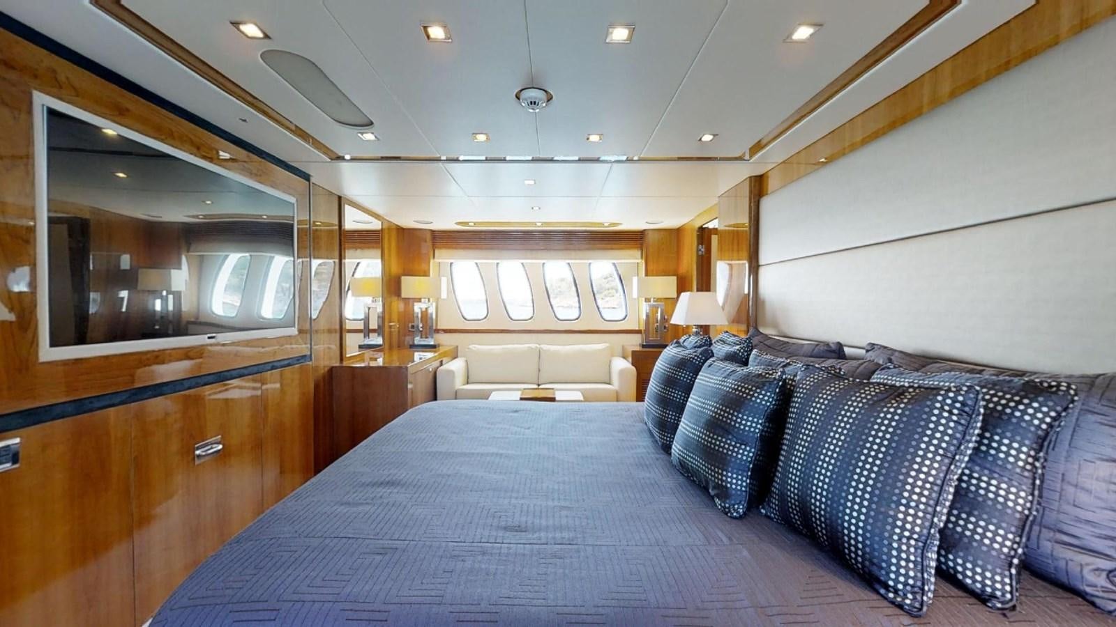 a large bed in a hotel room aboard WHITE PEARL I Yacht for Sale
