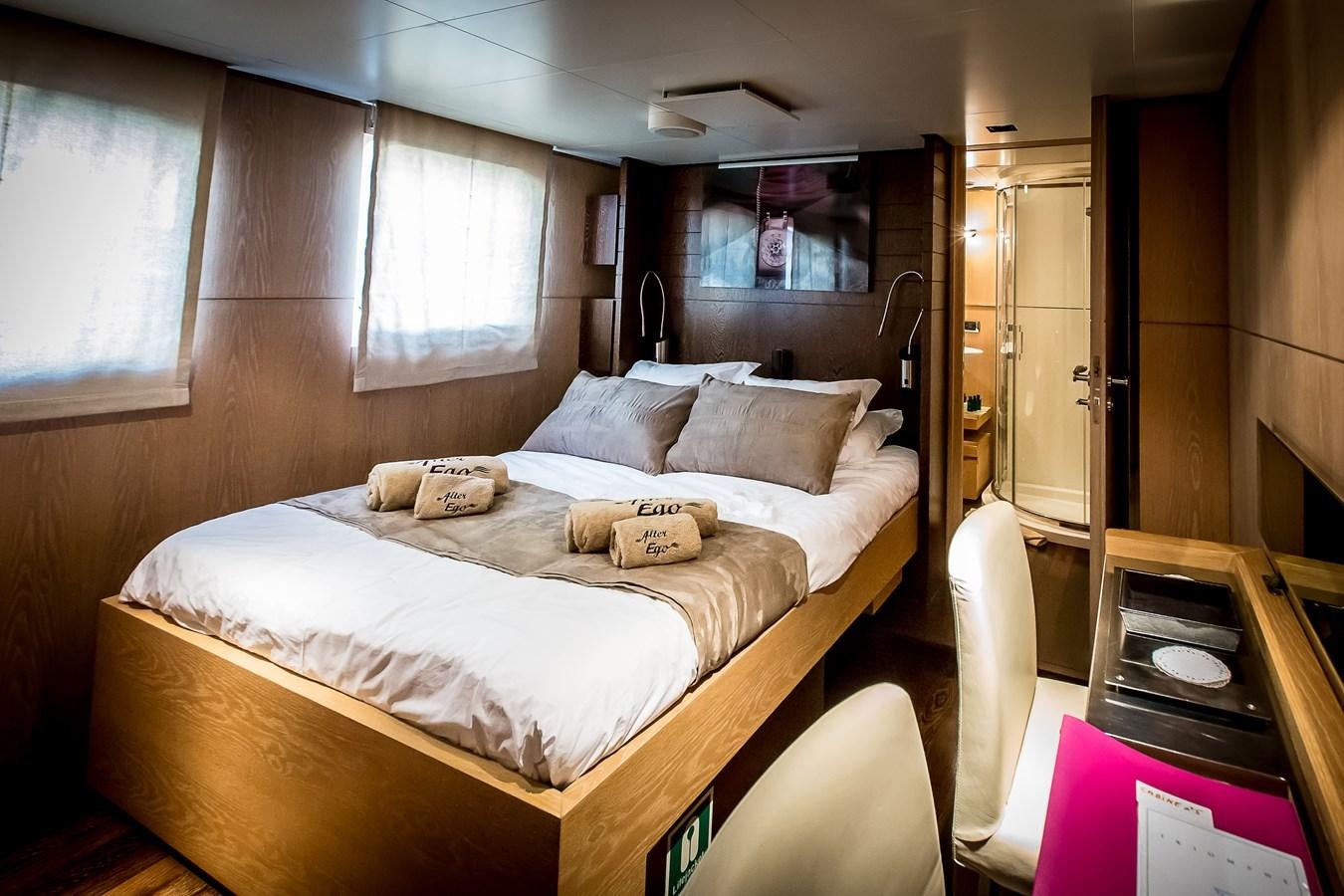 a bed in a room aboard ALTER EGO Yacht for Sale