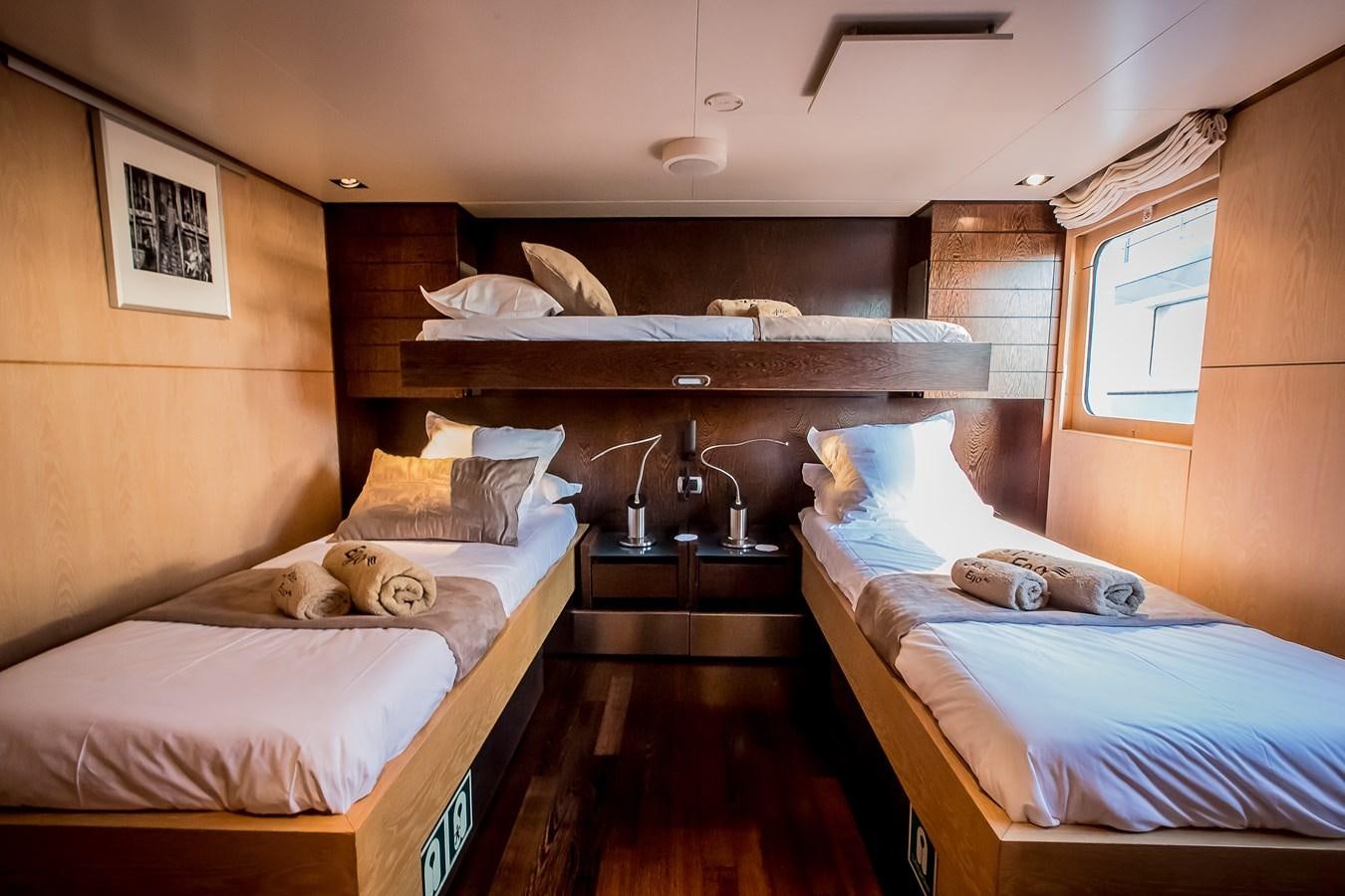 a room with two beds aboard ALTER EGO Yacht for Sale