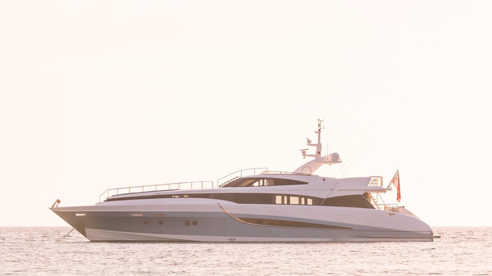 a large boat on a beach aboard BENITA BLUE Yacht for Sale