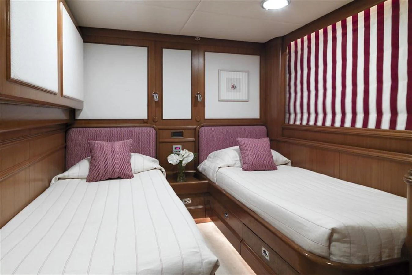 a room with two beds aboard SPADA Yacht for Sale