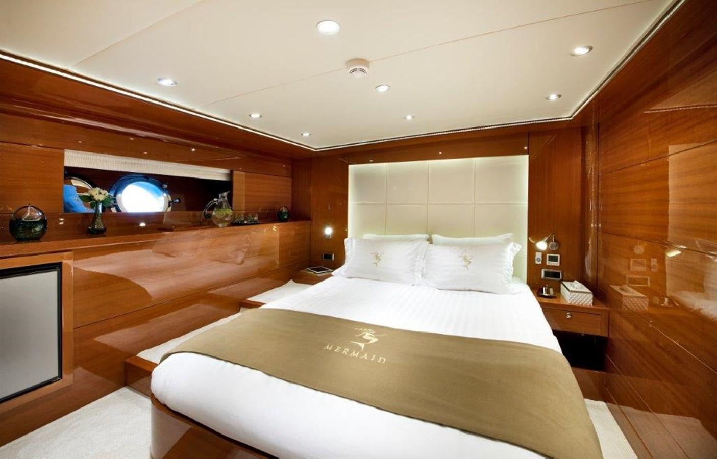 a bed in a room aboard MERMAID Yacht for Sale