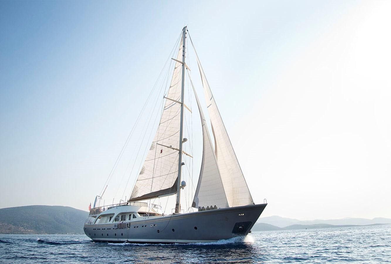 a white boat on the water aboard MERMAID Yacht for Sale