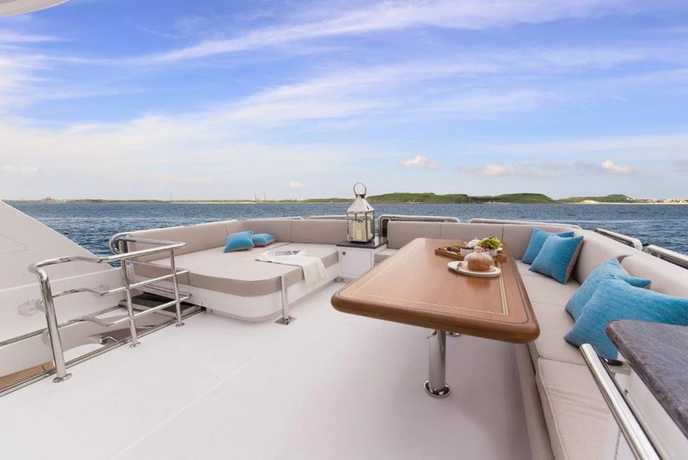 a table on a balcony overlooking the ocean aboard P110 (NEW BOAT SPEC) Yacht for Sale