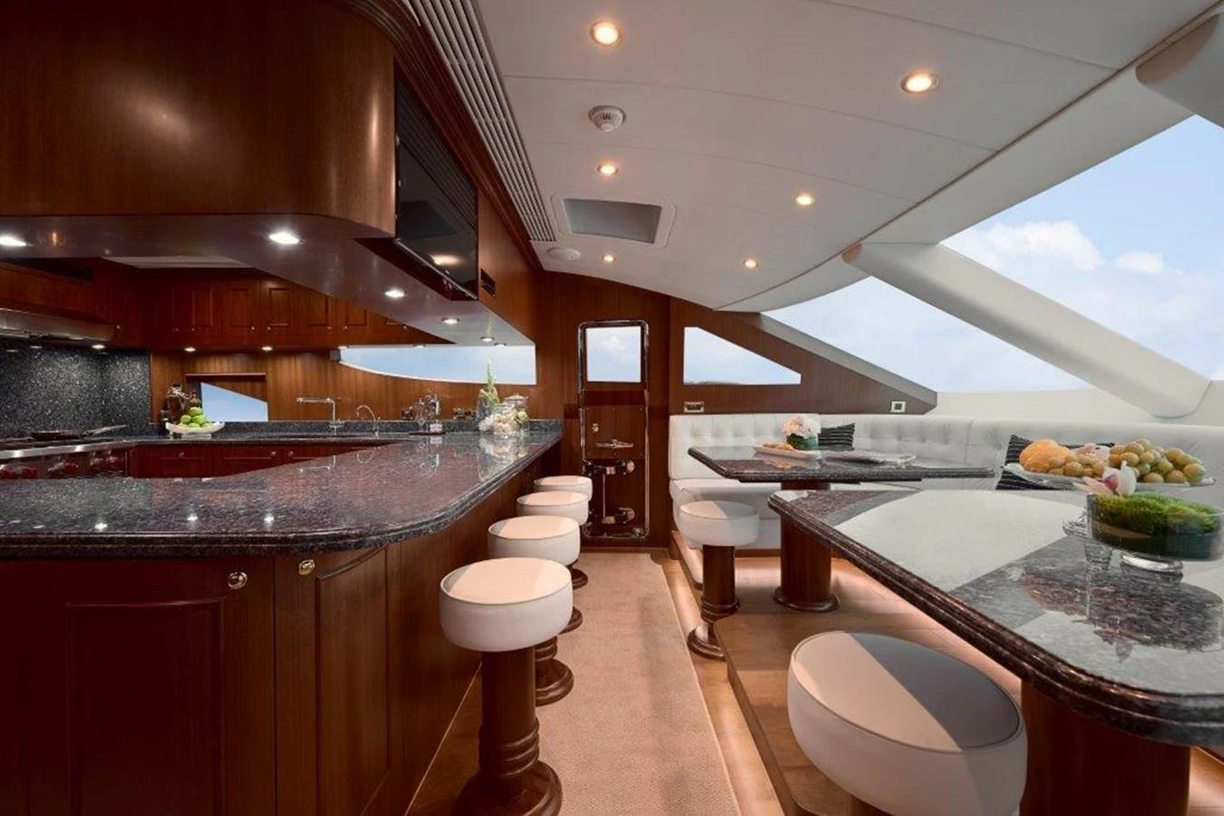 a modern kitchen with wooden cabinets aboard P110 (NEW BOAT SPEC) Yacht for Sale