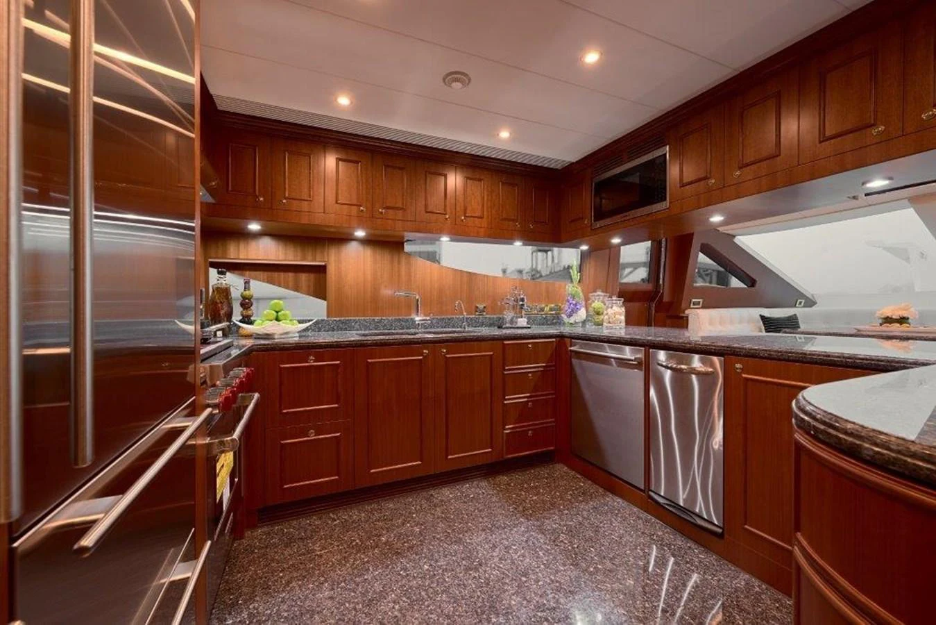a kitchen with wooden cabinets aboard P110 (NEW BOAT SPEC) Yacht for Sale