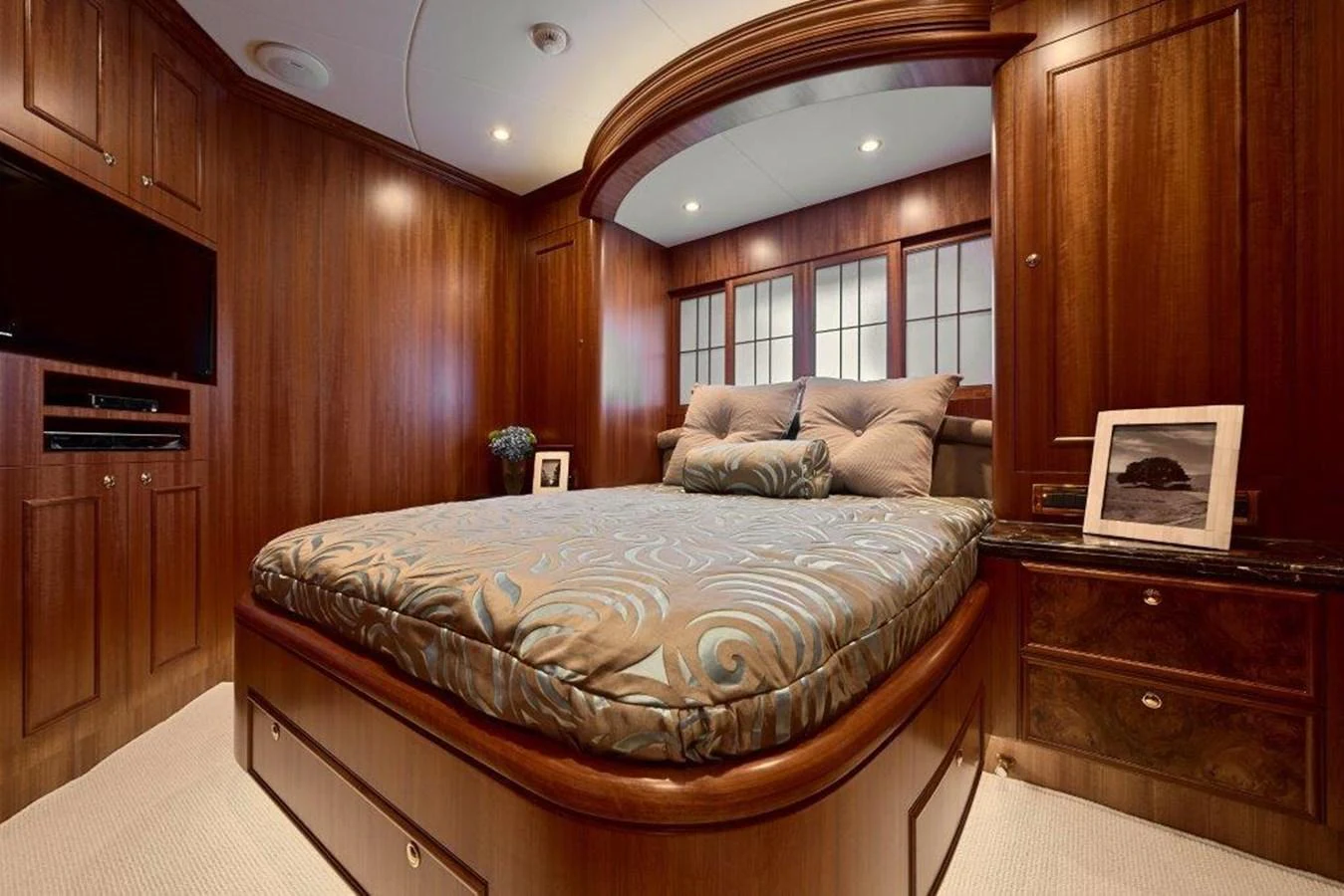 a bedroom with a bed and a television aboard P110 (NEW BOAT SPEC) Yacht for Sale